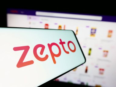 Stuttgart, Germany - 09-02-2023: Smartphone with logo of Indian grocery delivery company Zepto on screen in front of business website. Focus on center-left of phone display. clipart