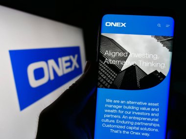 Stuttgart, Germany - 07-01-2023: Person holding smartphone with website of Canadian investment company Onex Corporation on screen with logo. Focus on center of phone display. clipart