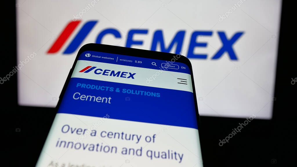 Stuttgart, Germany - 01-30-2025: Mobile phone with website of Mexican materials company CEMEX S.A.B. de C.V. on screen in front of business logo. Focus on top-left of phone display.