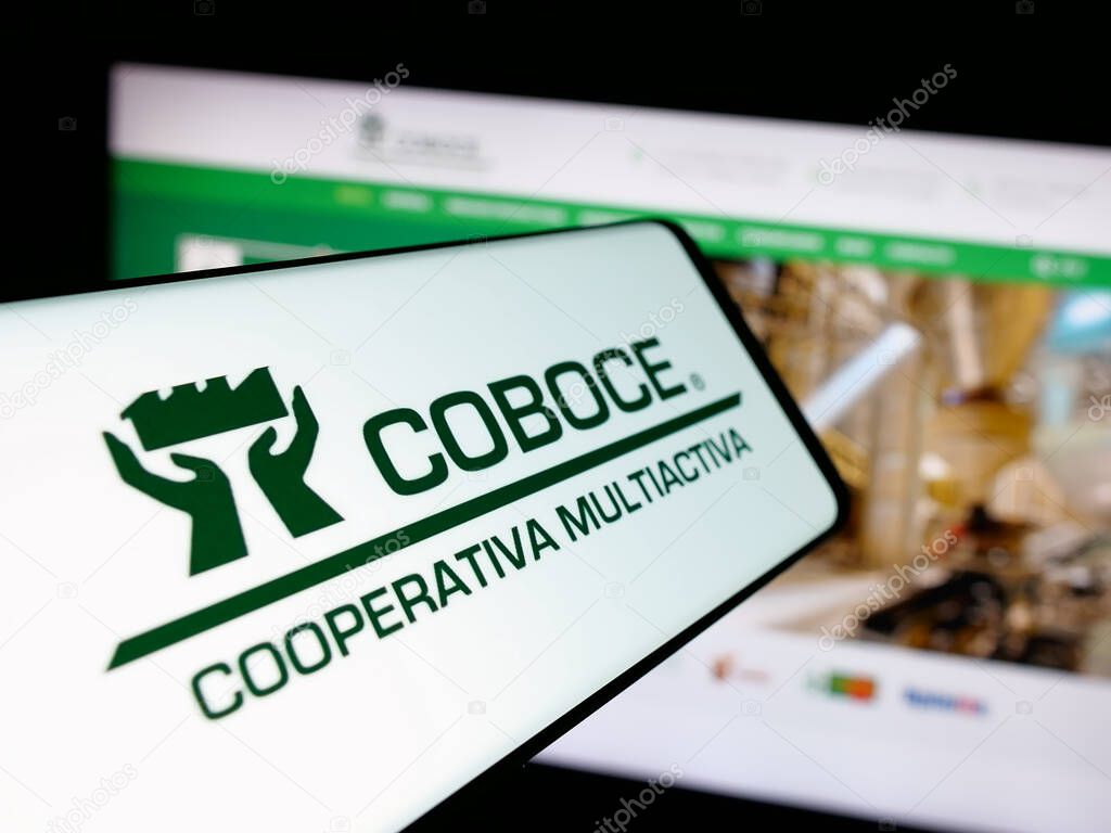 Stuttgart, Germany - 04-09-2025: Smartphone with logo of Cooperativa Boliviana de Cemento (COBOCE) on screen in front of website. Focus on center-left of phone display.