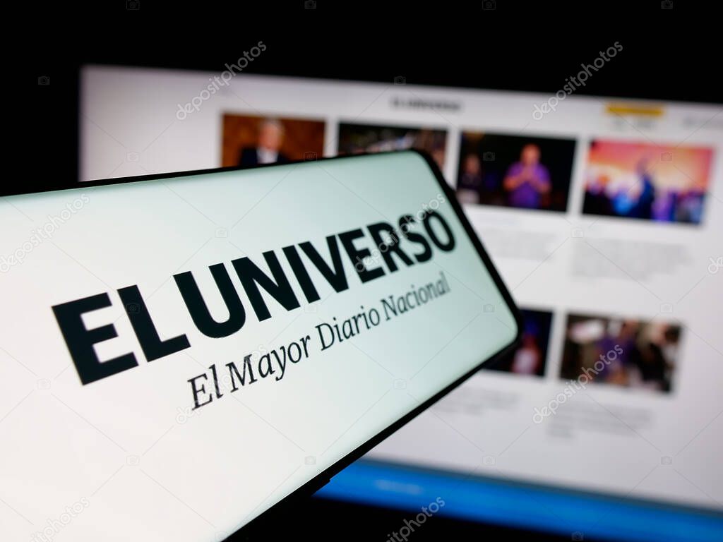 Stuttgart, Germany - 04-09-2025: Smartphone with logo of Ecuadorian newspaper El Universo on screen in front of website. Focus on center-left of phone display.