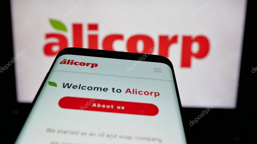 Stuttgart, Germany - 04-09-2025: Mobile phone with webpage of consumer goods company Alicorp S.A.A. (Peru) on screen in front of logo. Focus on top-left of phone display.