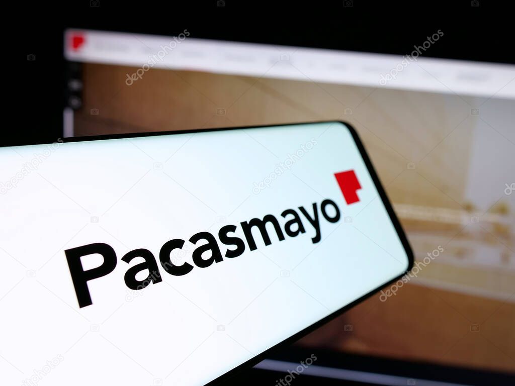 Stuttgart, Germany - 04-09-2025: Smartphone with logo of Peruvian company Cementos Pacasmayo S.A.A. on screen in front of website. Focus on center-left of phone display.