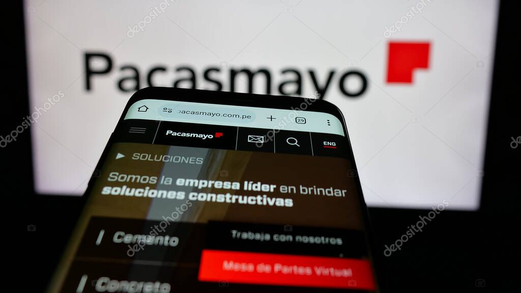 Stuttgart, Germany - 04-09-2025: Mobile phone with webpage of Peruvian company Cementos Pacasmayo S.A.A. on screen in front of logo. Focus on top-left of phone display.