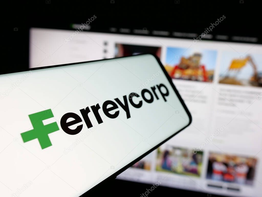 Stuttgart, Germany - 04-17-2025: Smartphone with logo of Peruvian machinery company Ferreycorp S.A.A. on screen in front of website. Focus on center-left of phone display.