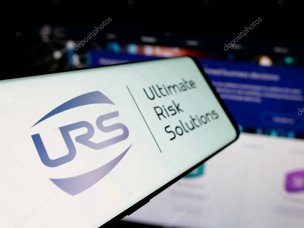 Stuttgart, Germany - 04-17-2025: Smartphone with logo of US company Ultimate Risk Solutions (URS) on screen in front of website. Focus on center-left of phone display.