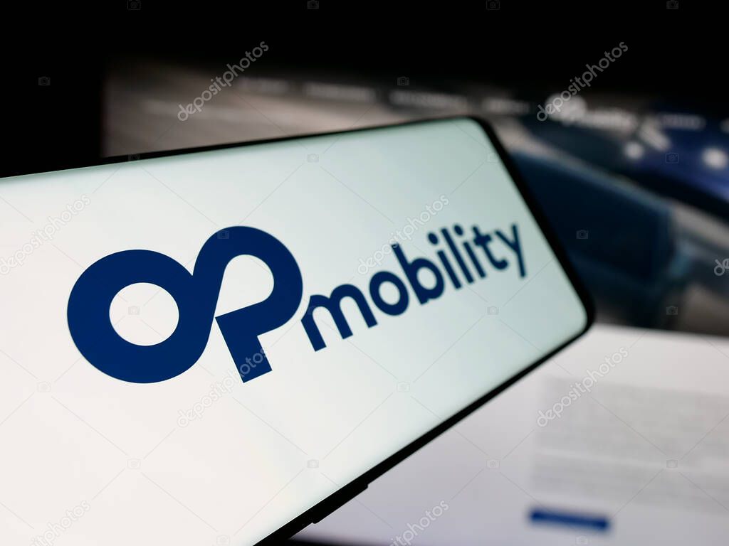 Stuttgart, Germany - 04-24-2025: Smartphone with logo of Franch automotive company OPmobility SE on screen in front of website. Focus on left of phone display.