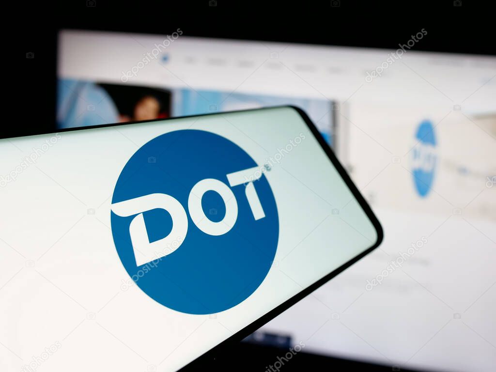 Stuttgart, Germany - 05-02-2025: Smartphone with logo of US foodservice company Dot Foods Inc. on screen in front of website. Focus on center-left of phone display.