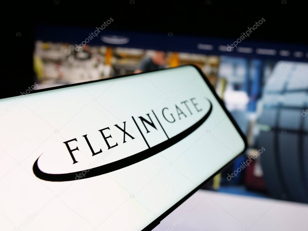 Stuttgart, Germany - 05-02-2025: Smartphone with logo of US automotive company Flex-N-Gate LLC on screen in front of website. Focus on center-left of phone display.