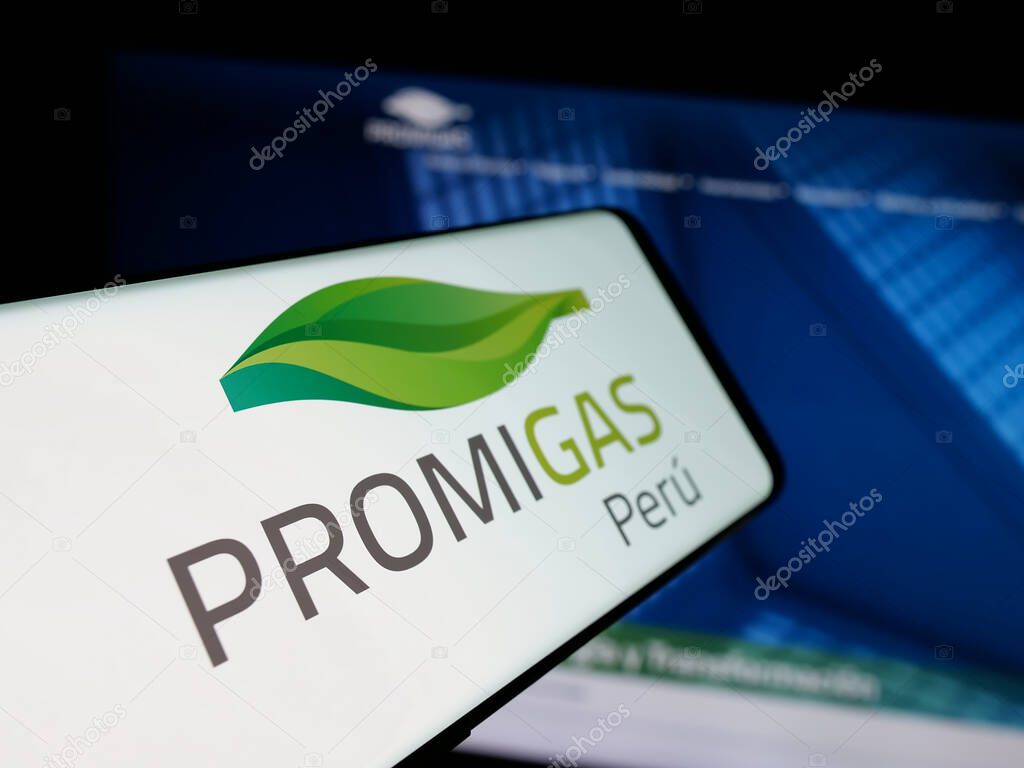 Stuttgart, Germany - 05-05-2025: Smartphone with logo of Colombian energy company Promigas S.A. E.S.P. on screen in front of website. Focus on center-left of phone display.