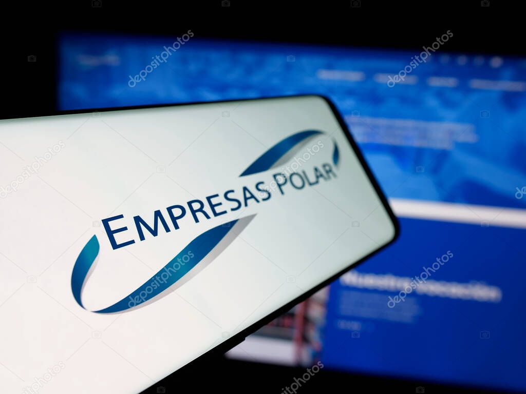 Stuttgart, Germany - 05-06-2025: Smartphone with logo of Venezuelan beverage company Empresas Polar on screen in front of website. Focus on left of phone display.