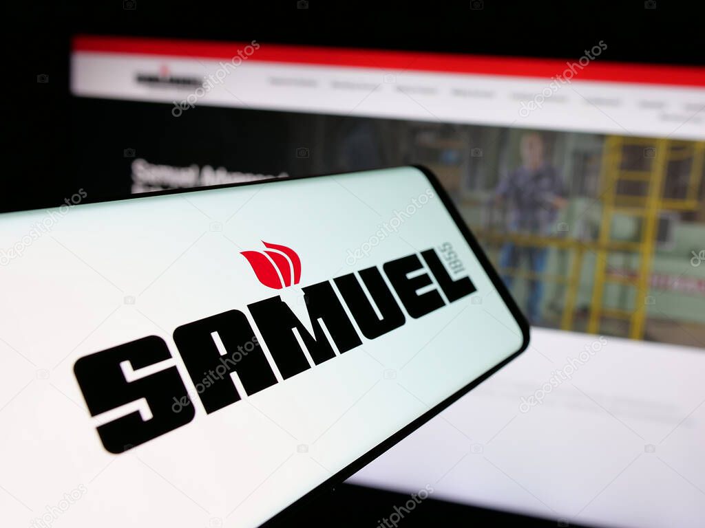 Stuttgart, Germany - 06-02-2025: Smartphone with logo of metal processing company Samuel Son Co. Inc. on screen in front of website. Focus on center of phone display.