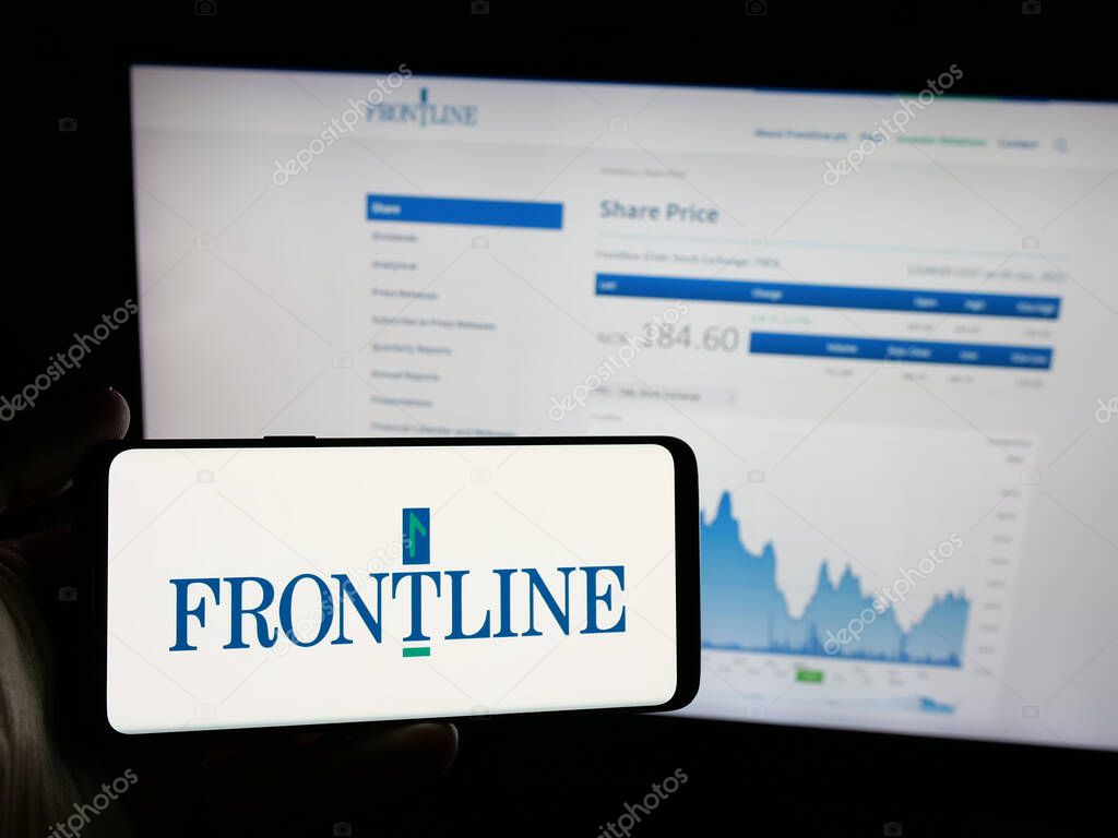 Stuttgart, Germany - 06-06-2025: Person holding smartphone with logo of oil tanker shipping company Frontline plc on screen in front of website. Focus on phone display.