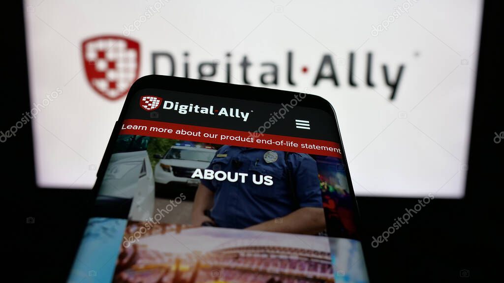 Stuttgart, Germany - 06-07-2025: Mobile phone with website of US video solutions company Digital Ally Inc. on screen in front of logo. Focus on top-left of phone display.