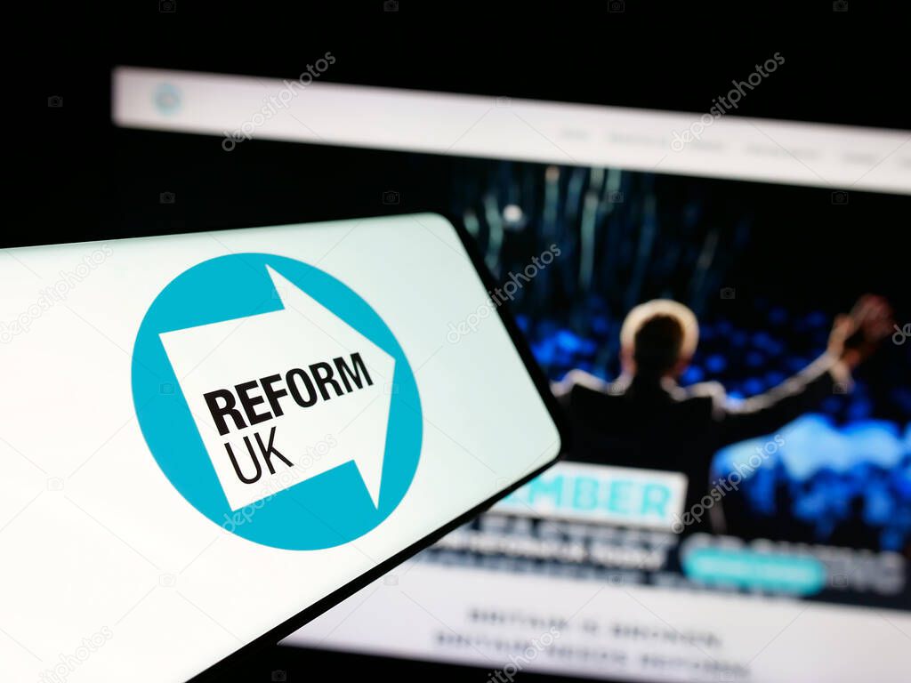Stuttgart, Germany - 07-09-2025: Smartphone with logo of British political party Reform UK on screen in front of website. Focus on center-left of phone display.