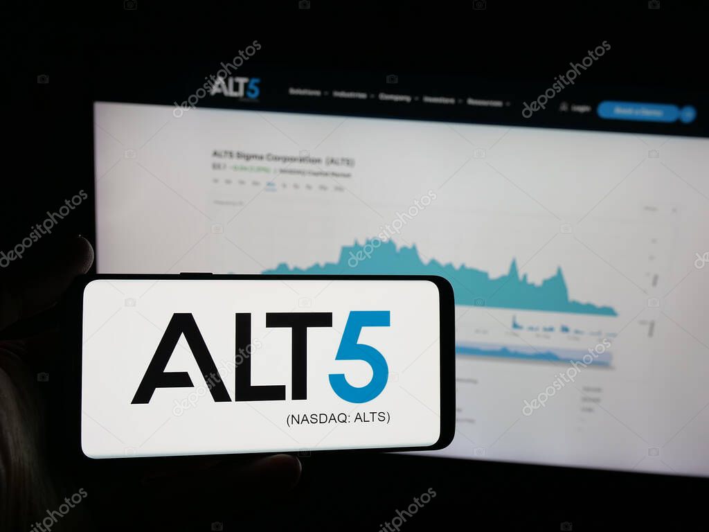 Stuttgart, Germany - 09-27-2025: Person holding smartphone with logo of US financial company ALT5 Sigma Corporation on screen in front of website. Focus on phone display.
