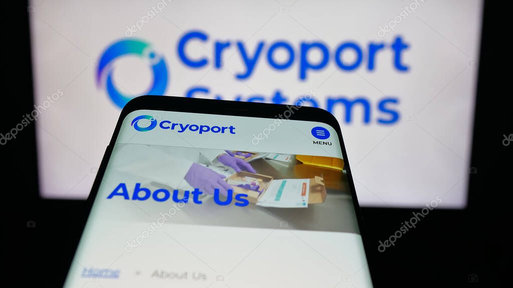 Stuttgart, Germany - 10-04-2025: Mobile phone with website of US supply chain company Cryoport Inc. on screen in front of logo. Focus on top-left of phone display.
