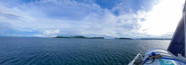Wide angle shot of an Island in the Sunda Strait, Indonesia from the Ship 
