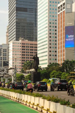 Sudirman Street in Jakarta with Statue of Sudirman