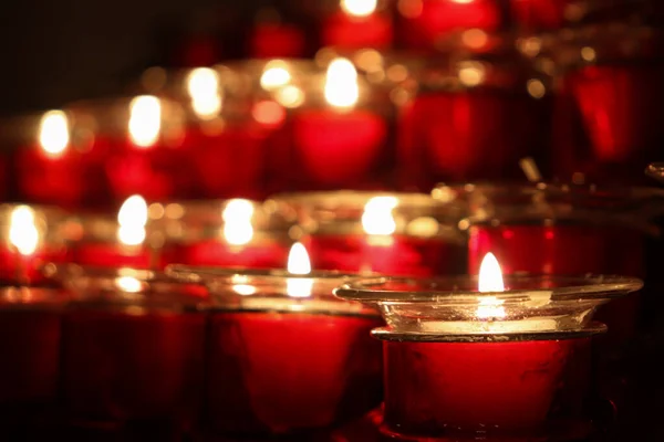 stock image Closed Up Picture of Red Candles that is Lit Arranged Neatly