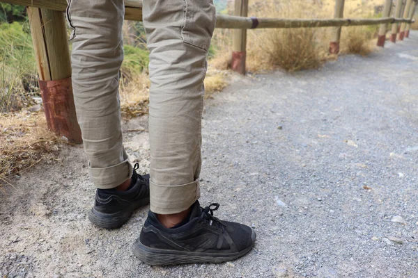 Person Long Khaki Pants Black Shoes Ready Cross Bridge Hiking — Stock Photo, Image