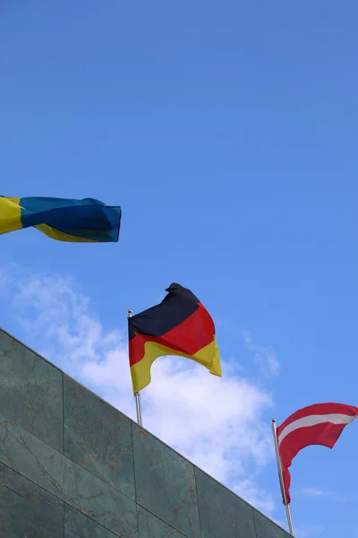 Germany Flag Waving Top Building Other Nations Flags — Stock Photo, Image