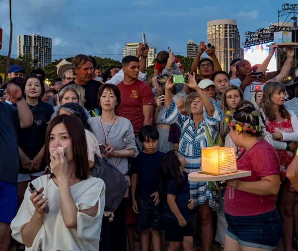 Stock image hawaii, honolulu - 20230530: Shinnyo Floating Lantern Festival - people look at the hundreds of floating lanterns.