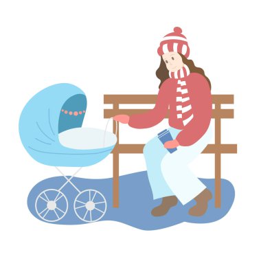 Parkta mavi bebek arabasıyla gezen annem. Kış mevsimi