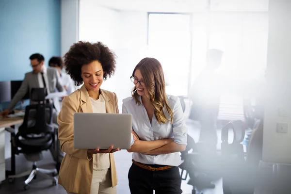 stock image Happy multiethnic smiling business women working together in office. Corporate business success concept