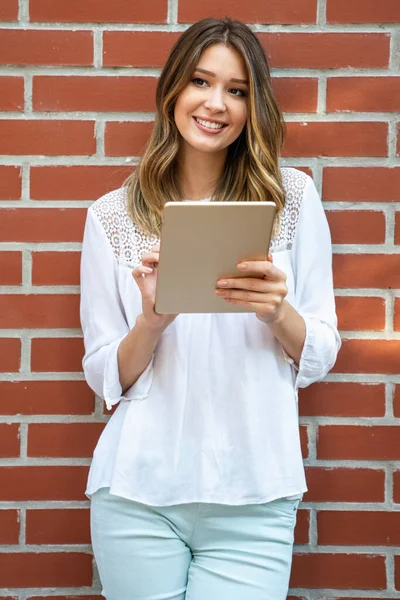 People tablet work connection technology concept. Happy young woman using digital tablet .