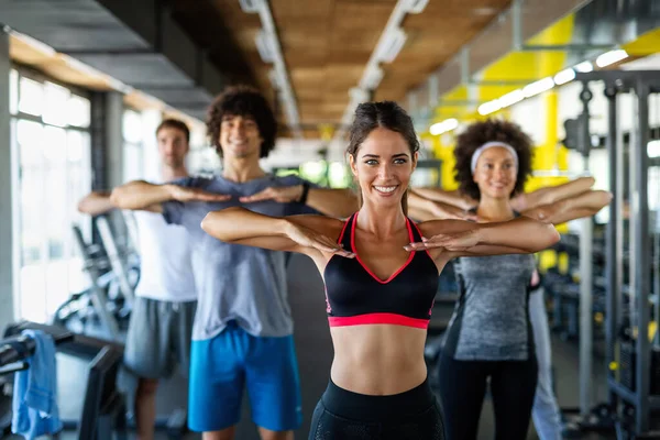 Group Young Fit People Friends Doing Exercises Together Gym Stay — Stock Photo, Image
