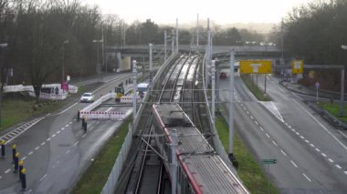 Dortmund, Germany - 05 January, 2023: Car traffic in the city of Dortmund, railway. High quality 4k footage