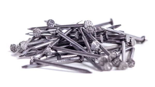 Stapel Kleine Grijze Metalen Nagels Geïsoleerd Witte Achtergrond Close Upzicht — Stockfoto