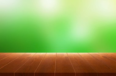 Perspektif tahta üzerine bulanık yeşil soyut arkaplan