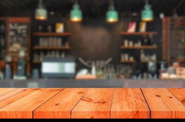 perspektif kahverengi ahşap tahta bulanık kahve tezgahı üzerine