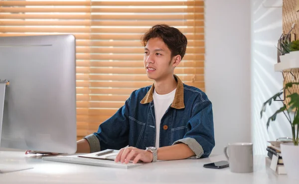 Smiling Young Asian Man Looking Computer Screen Working Online Browsing — Stock Photo, Image