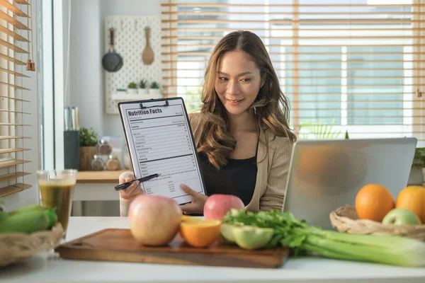 Beautiful Female Dietitian Having Conversation Video Call Showing Patient Example — Stock Photo, Image