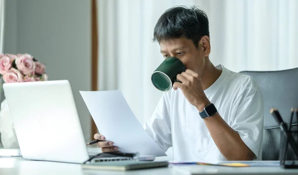 Successful Young Businessman Drinking Coffee Checking Financial Reports Office Desk — 스톡 사진