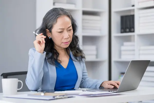 Serious Mature Businesswoman Sitting Work Table Reviewing Documents Financial Reports — Stock Photo, Image