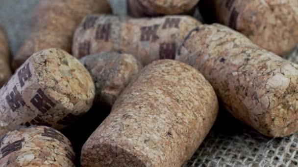 Different Champagne Wine Corks Wine Bottles Rotating Burlap Fabric Used — Vídeo de Stock