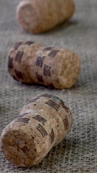 Different Champagne Wine Corks Wine Bottles Rotating Burlap Fabric Used — Stock Video