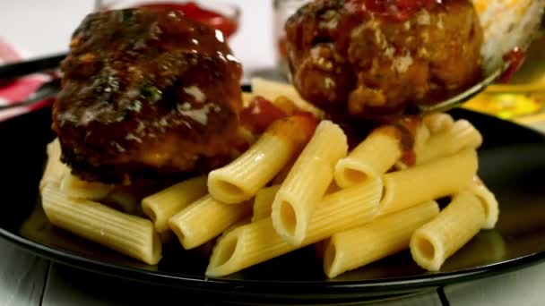 Penne Pasta Meatballs Pouring Tomato Sauce Dining Table Domestic Kitchen — Wideo stockowe