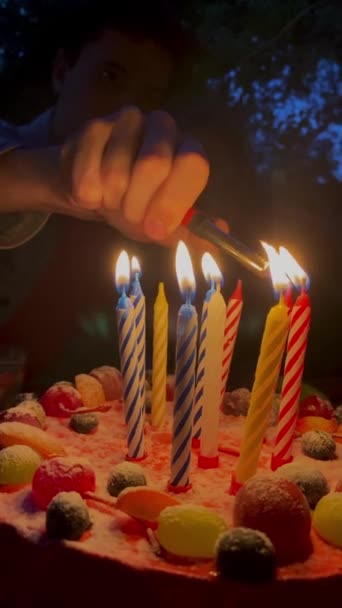 Human Hand Lighting Candle Birthday Cake Burning Lighter Darkness Burning — Stock Video
