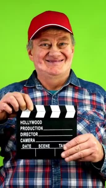 Friendly Amusing Senior Man Claps Clapperboard Film Production Mature Film — Stock Video