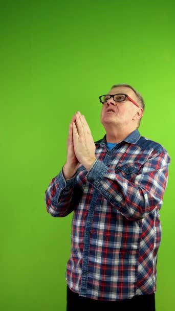 Senior Man Casual Clothing Prays Arms Raised Folded Palms Mature — Stock Video