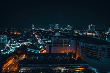 Panoramic view of Malacca skyline, traffic and light by night. Colourful city lights.