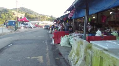 Cameron Highlands, Malaysia - Sep 16, 2022 POV  walking at Kea Farm morning market. 4K.