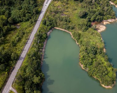 Green lake and rainforest tropical trees in Kuala Kubu Bharu, Malaysia.