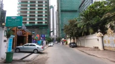 Phnom Penh Cambodia fast developing tall skyscrapers under construction . High quality FullHD footage