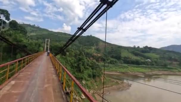Riding Motorcycle Small Suspension Bridge Beautiful Mountains River Vietnam High — Stock Video